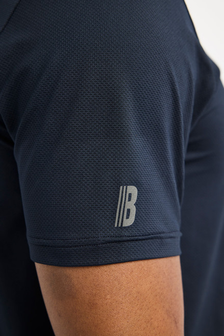 The BLAKLADER 3416 Dark navy blue Stretchy Polo Shirt is designed for comfort and functionality, making it an ideal choice for work and outdoor activities.