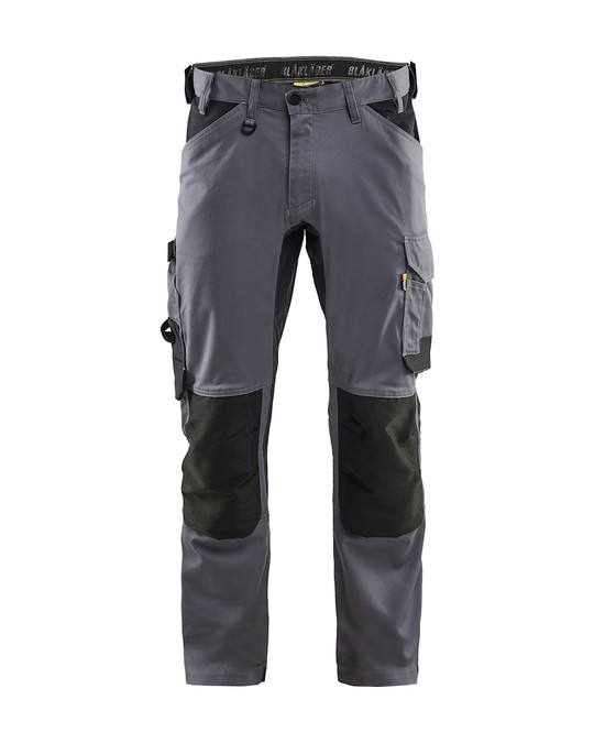 Whether on the job or off-duty, the BLAKLADER Trousers 1751 in Grey, featuring Kneepad Pockets, and made of Cotton with Stretch, keeps you moving freely.