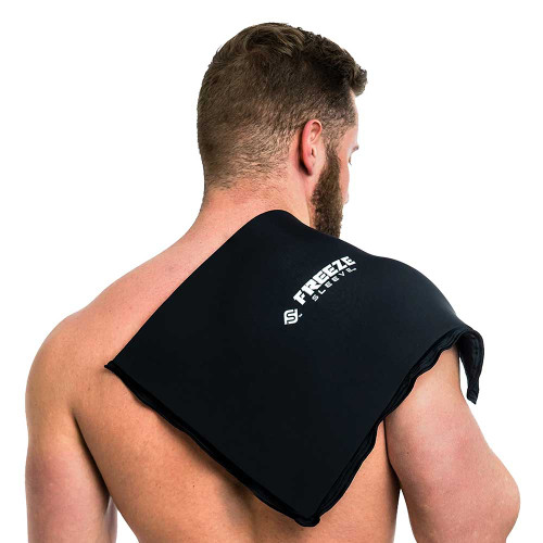A man wearing the Freeze Sleeve Flat Pak on his back and shoulder.