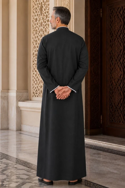 Elegant Black Saudi Thobe with White Embroidery – Modern & Classic
