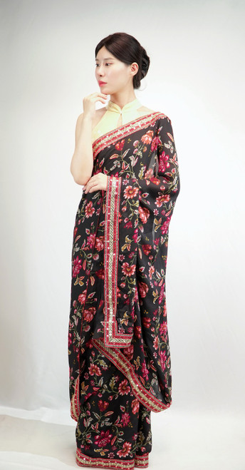 Elegant Black Floral Georgette Saree with Rich Embroidered Border Elegant Black Floral Georgette Saree with Rich Embroidered Border