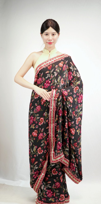 Elegant Black Floral Georgette Saree with Rich Embroidered Border Elegant Black Floral Georgette Saree with Rich Embroidered Border