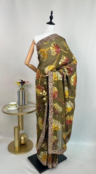 Olive Green Organza Saree with Majestic Multicolor Floral Embroidery & Ornate Scalloped Border Olive Green Organza Saree with Majestic Multicolor Floral Embroidery & Ornate Scalloped Border