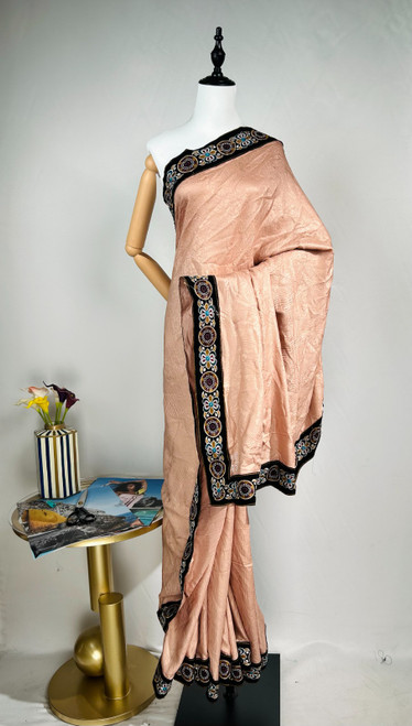 Elegant Pastel Pink Saree with Intricate Multicolor Embroidered Border Elegant Pastel Pink Saree with Intricate Multicolor Embroidered Border