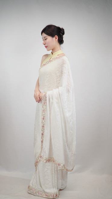 Timeless White Jacquard Saree with Embroidered Pastel Border Timeless White Jacquard Saree with Embroidered Pastel Border