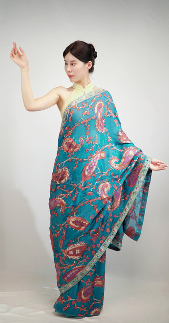 Teal Blue Saree with Vibrant Multicolor Paisley Patterns & Contrasting Silver Border Teal Blue Saree with Vibrant Multicolor Paisley Patterns & Contrasting Silver Border