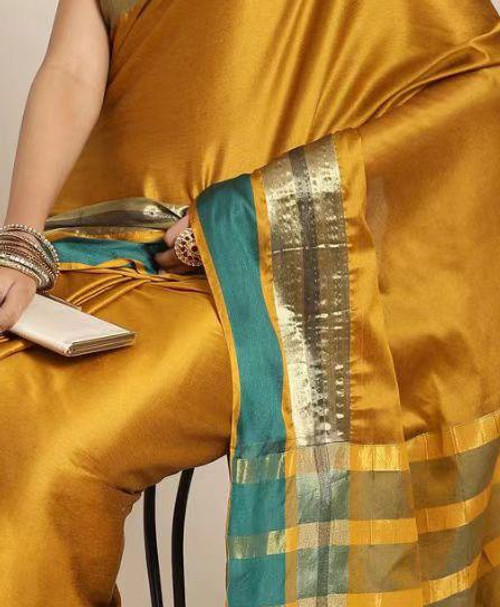 Hakoba Mustard Gold Kanchipuram Silk Saree with Dual-Tone Zari Border Hakoba Mustard Gold Kanchipuram Silk Saree with Dual-Tone Zari Border