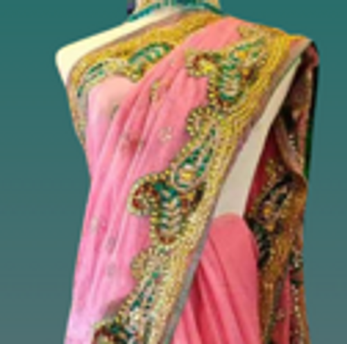 Pink Net Saree with Heavy Embellished Border & Paisley Motifs Pink Net Saree with Heavy Embellished Border & Paisley Motifs