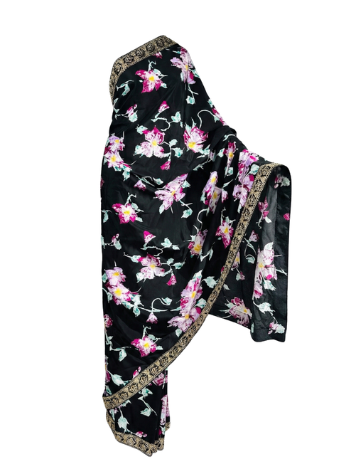 Elegant Black Floral Print Saree with Ornate Gold Border