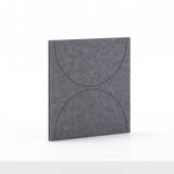 Soft Panel pour meuble Cubox en gris granit sans bouton métallique, photo en studio, vue de trois quarts, motif de deux arcs opposés
