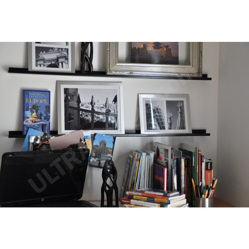 3ft black ledges with frames and books