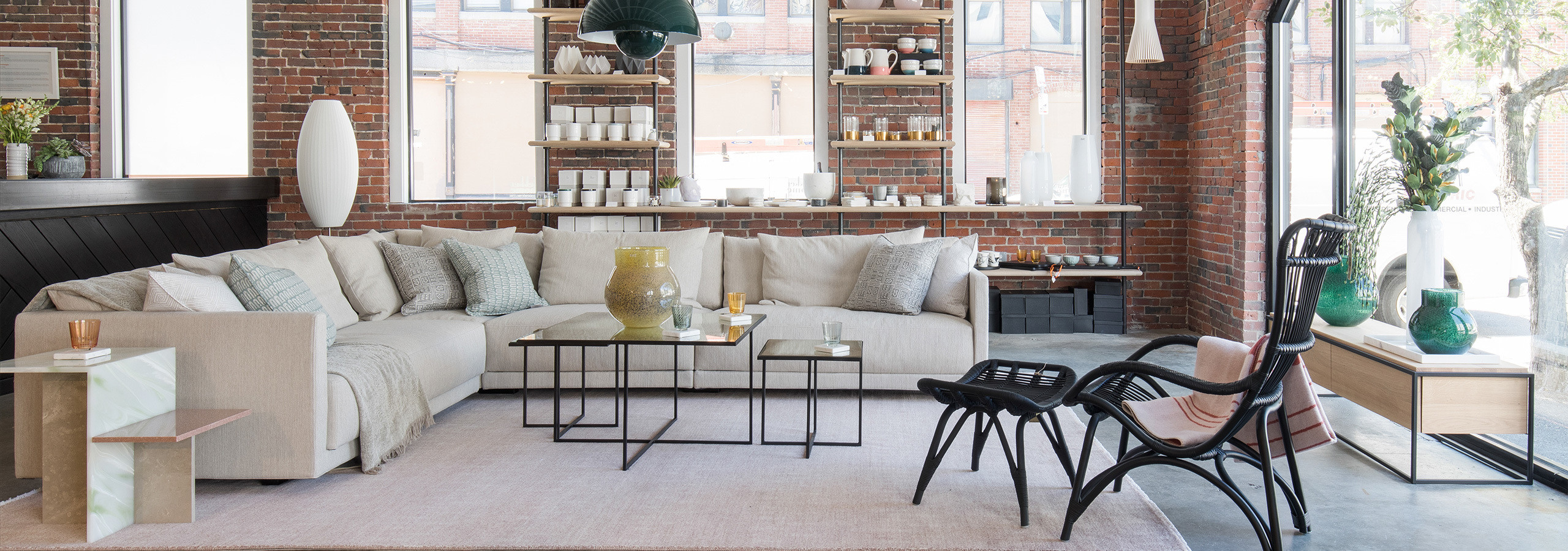 Lekker Home showroom vignette with seating and lighting