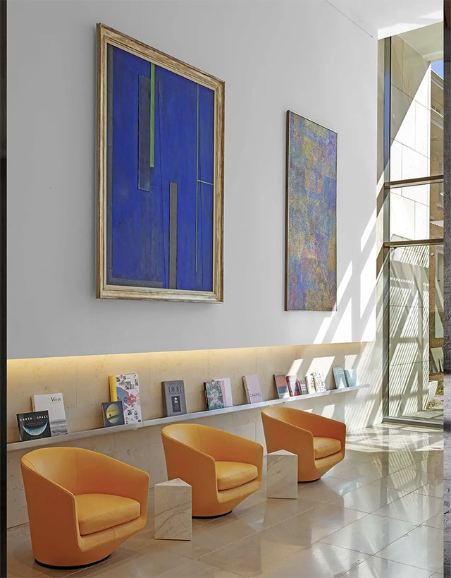 U Turn Chairs in a bright, modern gallery lounge.