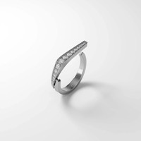 Close-up of Frammenti ring with 0.42ct hand-set diamonds, artisanal white gold band, Made in Italy.