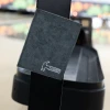 Hammer Magnetic Shammy hanging on metal scoring unit at ball return