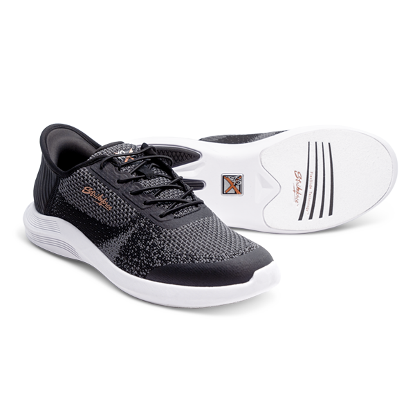 Close-up of Pilot black woven mesh upper and elastic laces wide width