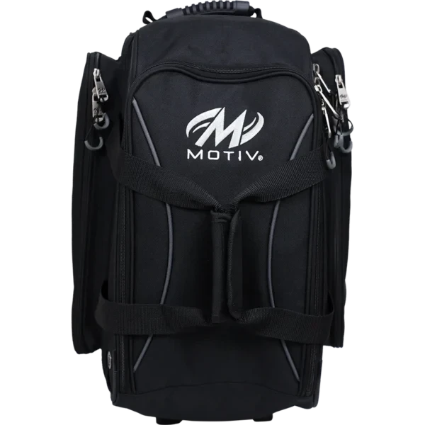 Front view of the Covert Black Motiv Velocity double roller with a zippered front pocket, gray piping and side accessory pockets
