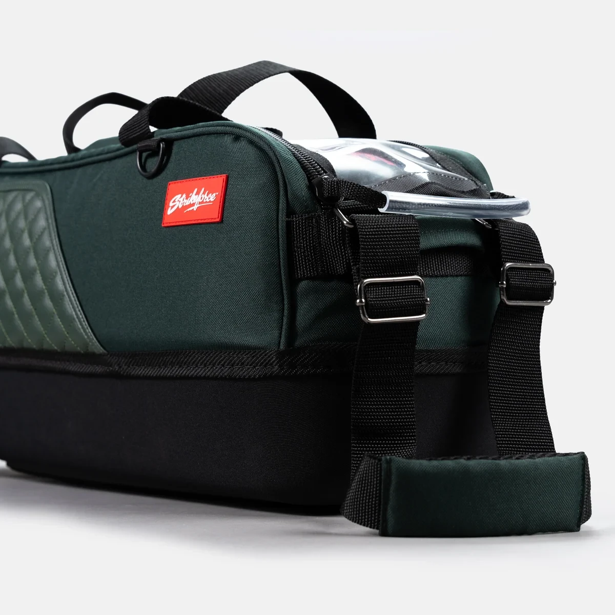 Red Strikeforce logo patch and padded tow strap on Hunter Green Diamond Slim Triple Tote