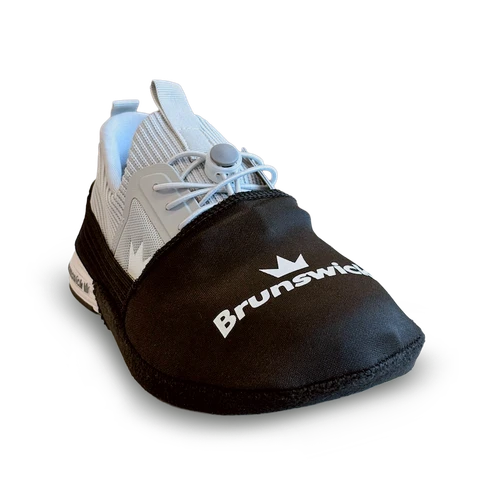 Close up of Brunswick black suede shoe slider on bowling shoe