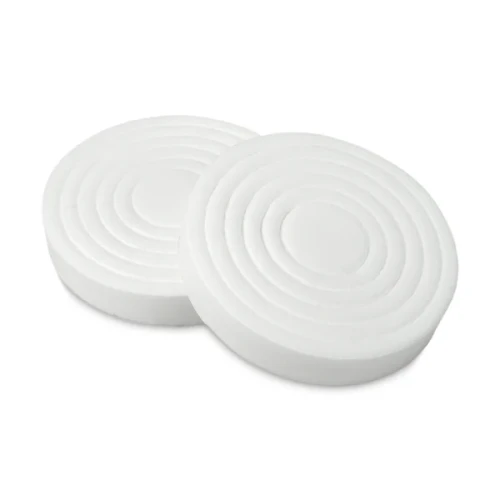Stack of Tenth Frame round thumb plug dams showing high-density closed-cell foam