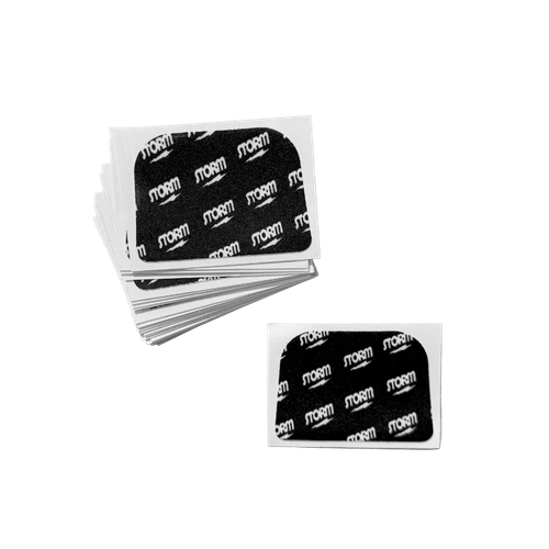 Stack of pre-cut Storm Ultra Protect bowling tape pieces in black with white Storm logos