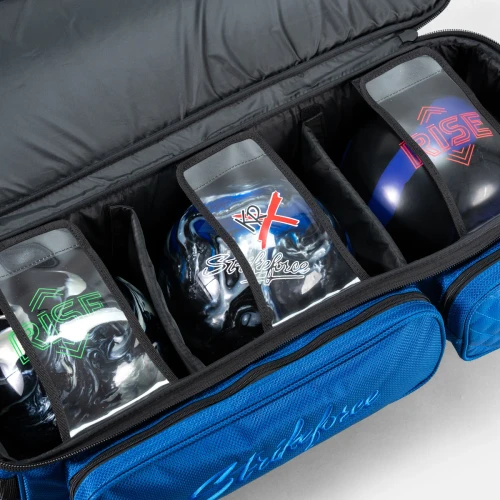 Three bowling balls in padded dividers inside KR Strikeforce Diamond Dually triple roller