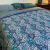 Hand Block printed corn flower design featuring large flowers in white, aqua, and indigo blue. In this reversible quilt, both sides are the same.
