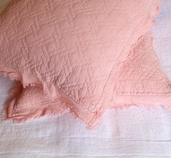 Musk Pink Queen size Vintage style coverlet with matching pillowcases and frayed cotton crepe edging.