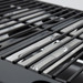 Close up on the grates of the grill.