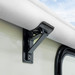 RV awning roller support installed on a trailer.