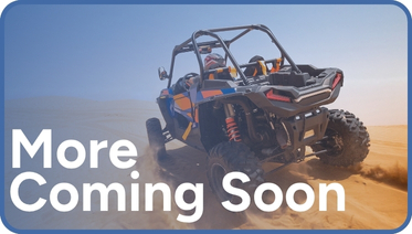 ATV riding through desert titled 