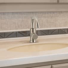 faucet installed on white countertop