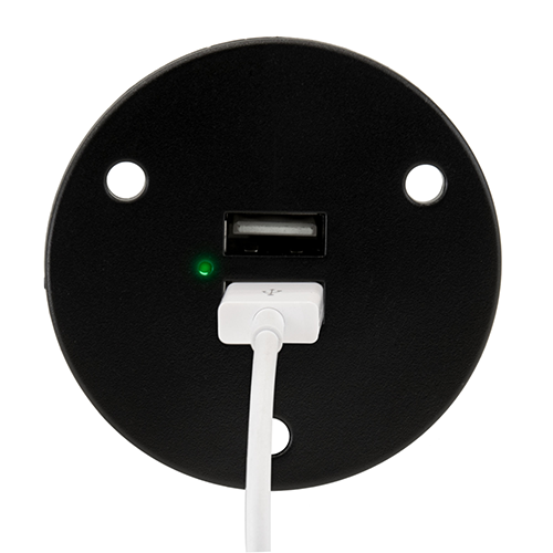 Black RV dual USB charger socket with a USB charger plugged into the lower port.