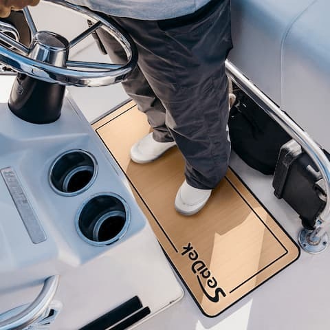 helm pad being used on boat helm