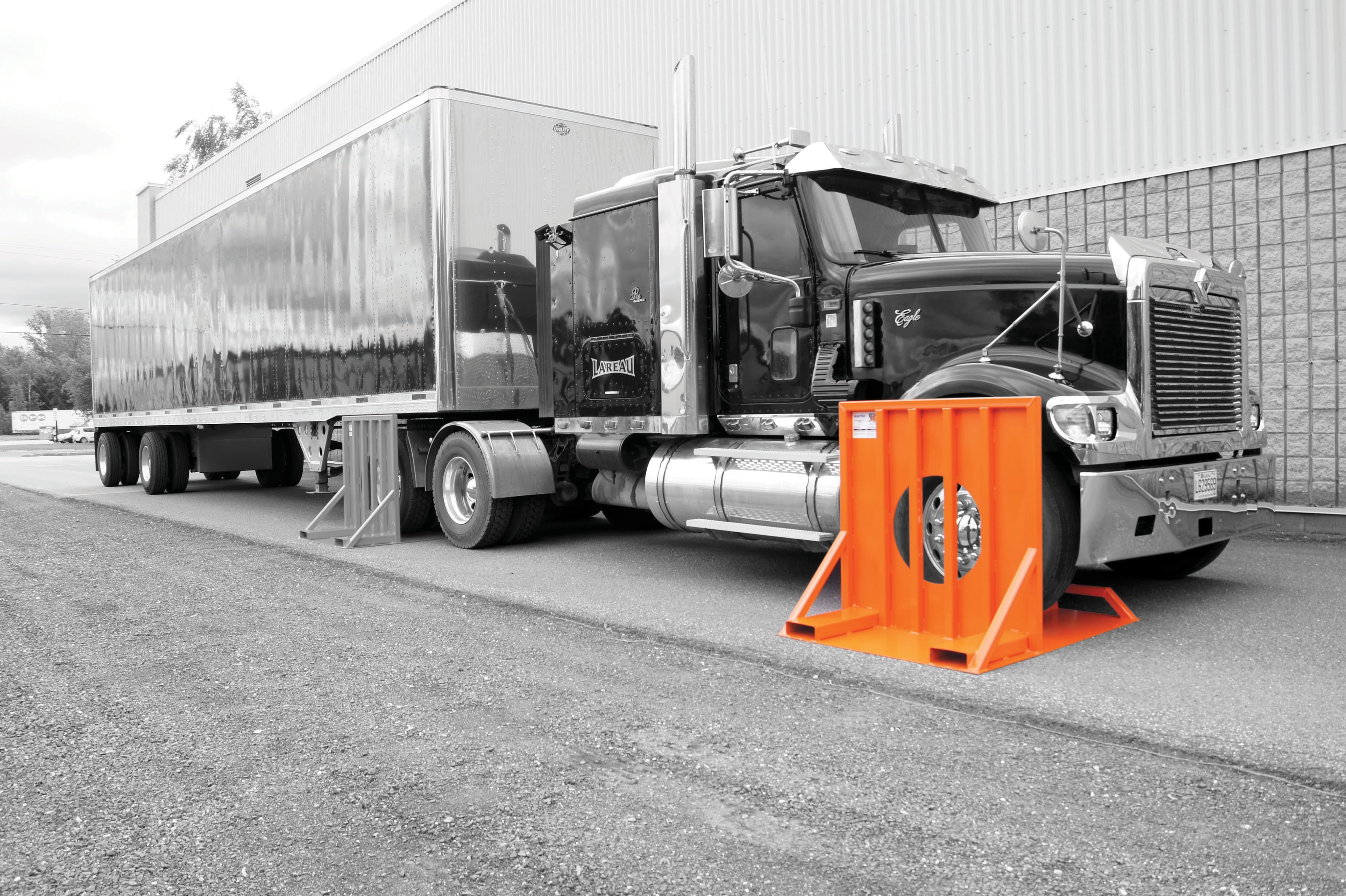 A tire barrier in front of a truck