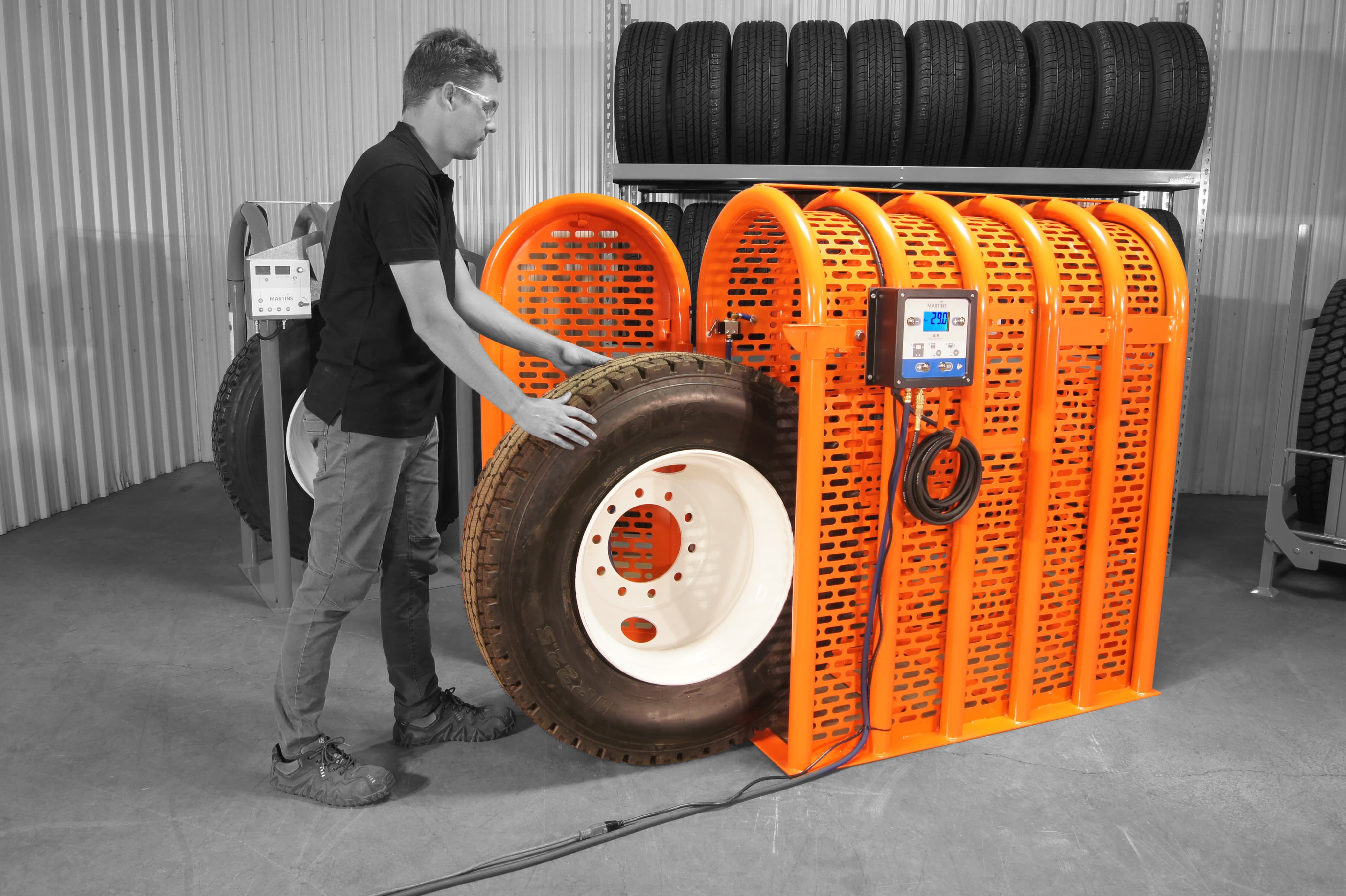 A tire safety inflation cage
