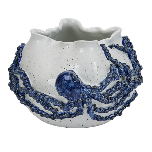 Blue and white handmade Thai ceramic octopus bowl with sculpted cobalt-blue tentacles and an organic wavy rim on a white background.