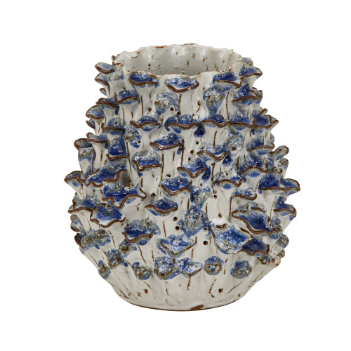 Handmade Thai blue and white coral ceramic vase with dimensional ocean-inspired detailing on white background