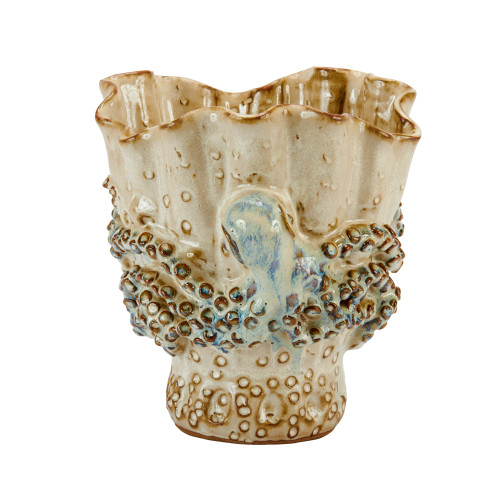 Medium aqua and cream octopus ceramic vase with sculptural tentacle detailing on white background.