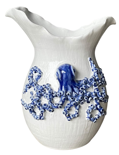 Extra large handmade blue and white octopus ceramic vase with sculpted cobalt blue tentacle detailing on a white background.