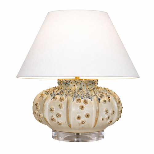 Handmade Thai ivory and taupe sea urchin ceramic table lamp with white linen shade on white background