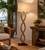 Seaside Curve rope floor lamp FL133 styled beside coastal seating with its 67-inch curved natural rope silhouette fully visible.