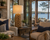 Pier Weave marine rope table lamp L120 styled on an end table in an upscale coastal living room beside upholstered seating.