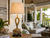 Monkey’s Fist natural rope table lamp L129 styled in a tropical coastal lanai beside woven seating and greenery.