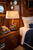 Anchor rope table lamp L138 styled on a bedside table in a warm coastal bedroom with soft ambient lighting.