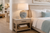 Handmade Thai blue and white sea anemone table lamp L452B styled beside seating in a sophisticated coastal interior