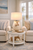 Handmade Thai white ceramic crab table lamp displayed in a neutral coastal living room