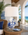 Handmade Thai blue and white ceramic sea life table lamp displayed in a Hawaii-style coastal interior