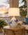 Handmade Thai blue and white ceramic sea crab table lamp displayed in a tropical coastal lifestyle setting