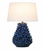 Handmade Thai blue anemone ceramic table lamp with deep blue textured base and white linen shade on a white background.